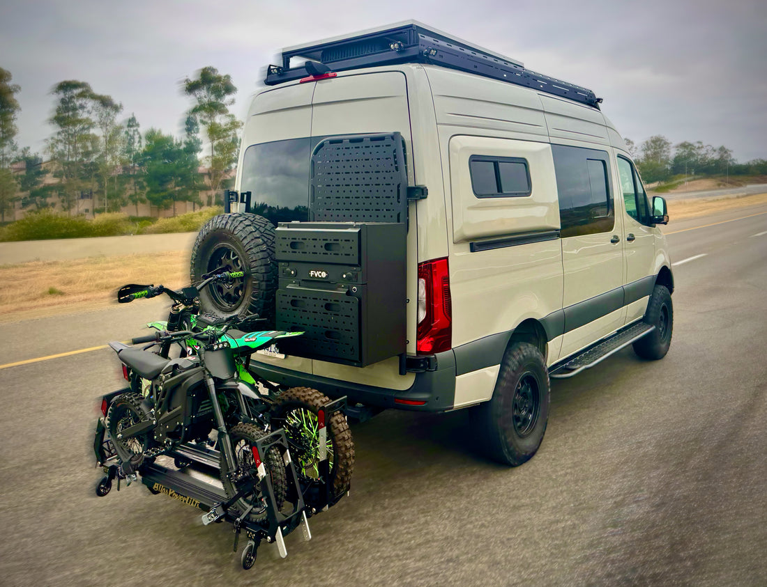 A sprinter van carrying an Atlas Lift rack driving down a highway